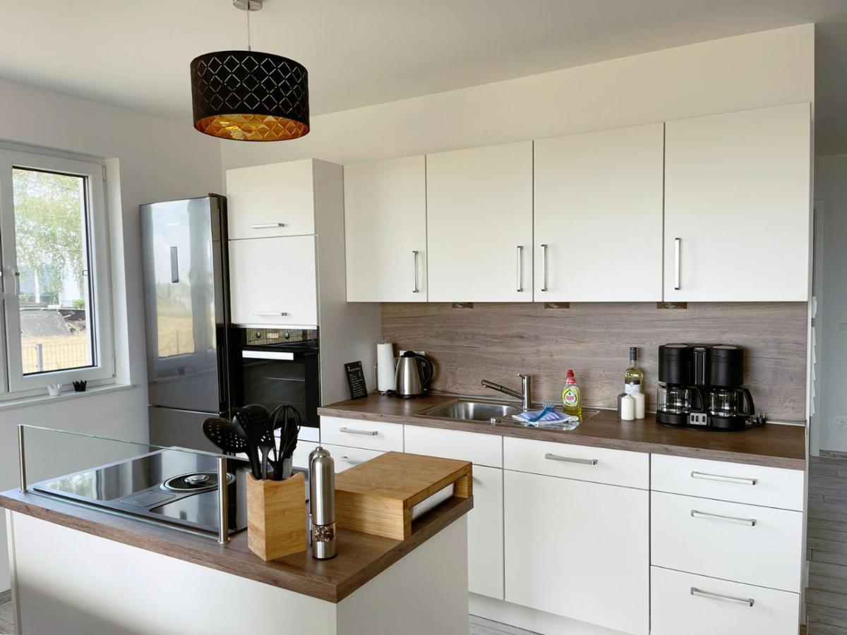 Exklusives Apartment mit Blick auf den See Grossraeschen Exterior foto